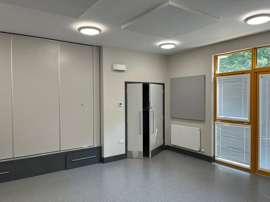 Community centre hall with feature colour wall