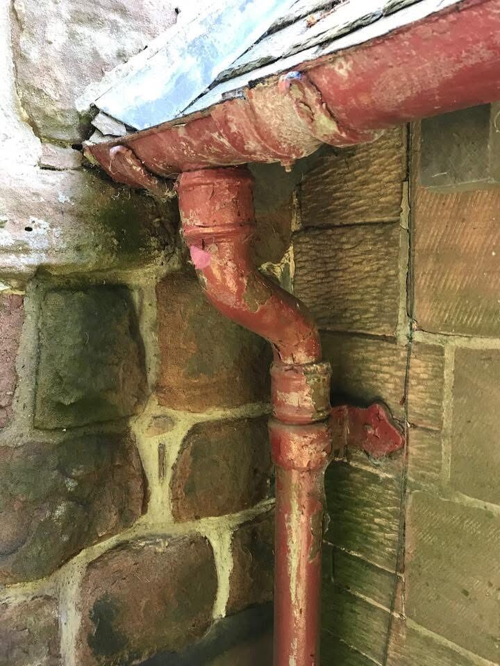 Church guttering and drainpipe, freshly repainted