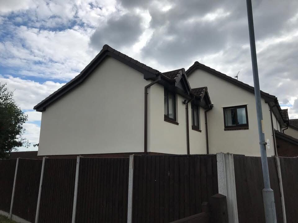 House exterior repaint, crisp white finish
