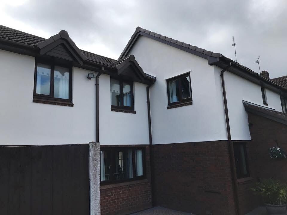 House exterior guttering and eaves, freshly painted
