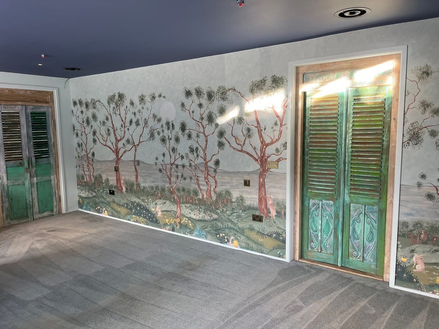 Hand-applied scenic mural feature wall