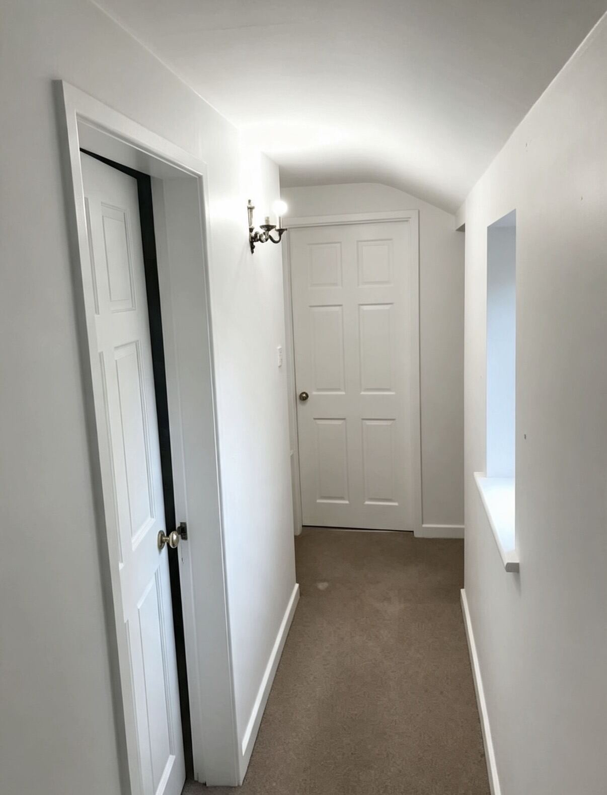 Freshly painted hallway with staircase